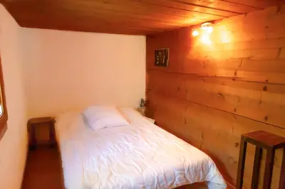 Ein Bett oder Betten in einem Zimmer der Unterkunft Chalet Edelweiss