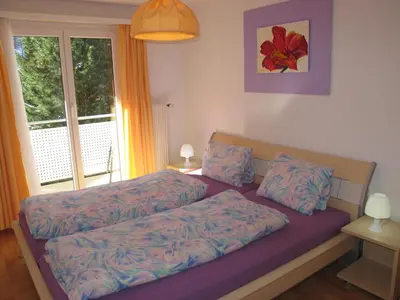 Ein Bett oder Betten in einem Zimmer der Unterkunft Aurora Appartement LAGGIN by FeWo-PLAN SAAS231