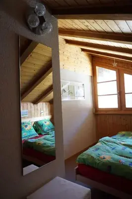 Ein Bett oder Betten in einem Zimmer der Unterkunft Vue à couper le souffle Arellaz 42