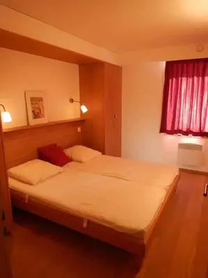 Ein Bett oder Betten in einem Zimmer der Unterkunft Ryad B Charmant et Chaleureux