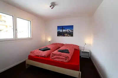 Ein Bett oder Betten in einem Zimmer der Unterkunft Perrine 1: Modern 3-room apartment
