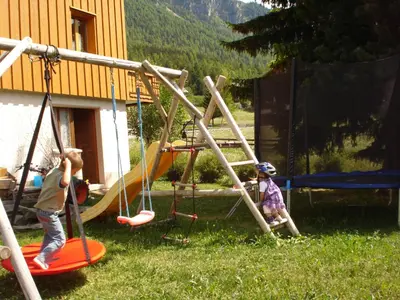 Ein Kinderspielbereich in der Unterkunft Chalet Petunia