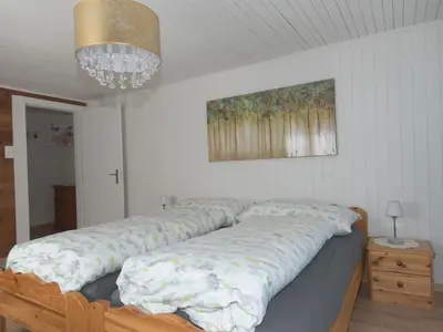 Ein Bett oder Betten in einem Zimmer der Unterkunft Apartment Wiedersehen by Interhome