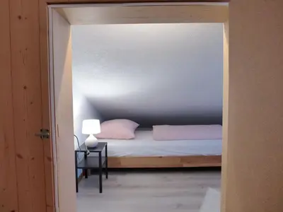 Ein Bett oder Betten in einem Zimmer der Unterkunft Apartment Chalet Vamika by Interhome