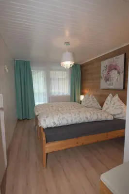 Ein Bett oder Betten in einem Zimmer der Unterkunft Apartment Wiedersehen by Interhome