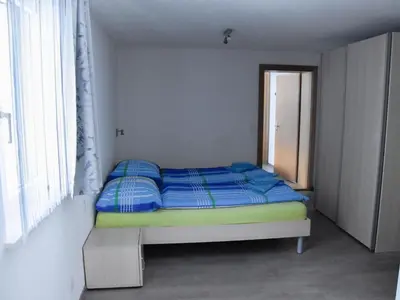 Ein Bett oder Betten in einem Zimmer der Unterkunft Apartment Amasaas by Interhome