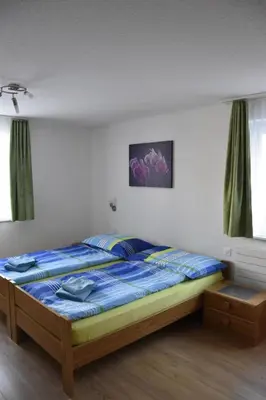 Ein Bett oder Betten in einem Zimmer der Unterkunft Apartment Amasaas by Interhome