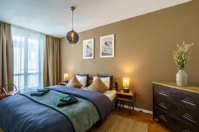 Ein Bett oder Betten in einem Zimmer der Unterkunft Heart of Interlaken Apartments