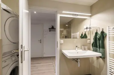 Ein Badezimmer in der Unterkunft Heart of Interlaken Apartments