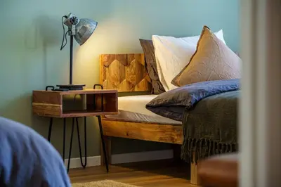 Ein Bett oder Betten in einem Zimmer der Unterkunft Heart of Interlaken Apartments