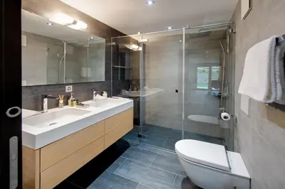 Ein Badezimmer in der Unterkunft Casa delle Stelle by Zermatt Premium Apartments