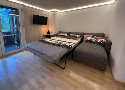 Ein Bett oder Betten in einem Zimmer der Unterkunft Chalet Ribi