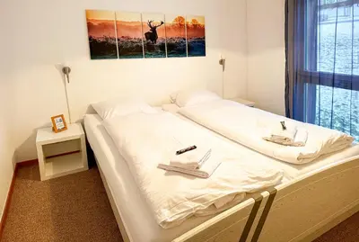 Ein Bett oder Betten in einem Zimmer der Unterkunft Chalet Ribi