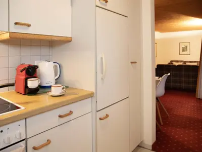 Küche/Küchenzeile in der Unterkunft Apartment Chalet Abendrot apARTments-13 by Interhome