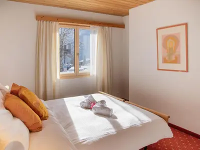 Ein Bett oder Betten in einem Zimmer der Unterkunft Apartment Chalet Abendrot apARTments-15 by Interhome