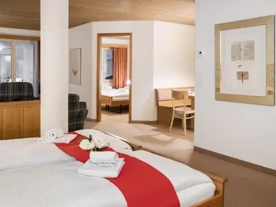 Ein Bett oder Betten in einem Zimmer der Unterkunft Apartment Chalet Abendrot apARTments-17 by Interhome