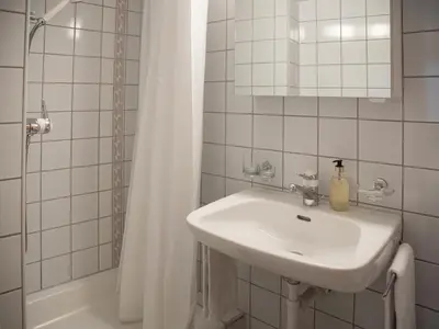 Ein Badezimmer in der Unterkunft Apartment Chalet Abendrot apARTments-2 by Interhome