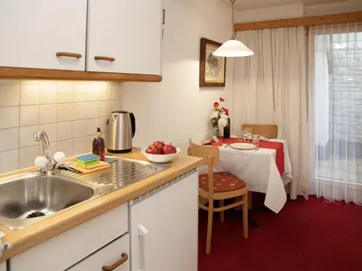 Küche/Küchenzeile in der Unterkunft Apartment Chalet Abendrot apARTments-2 by Interhome