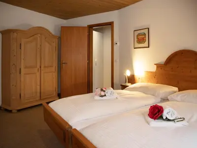 Ein Bett oder Betten in einem Zimmer der Unterkunft Apartment Chalet Abendrot apARTments-20 by Interhome