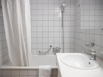 Ein Badezimmer in der Unterkunft Apartment Chalet Abendrot apARTments-20 by Interhome