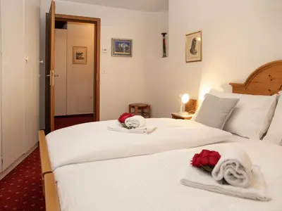 Ein Bett oder Betten in einem Zimmer der Unterkunft Apartment Chalet Abendrot apARTments-24 by Interhome