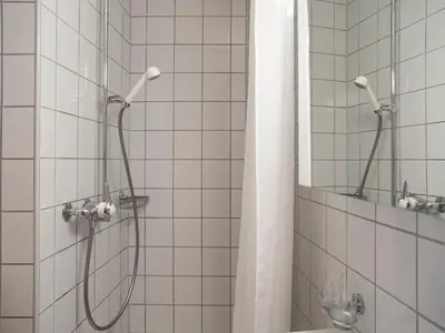 Ein Badezimmer in der Unterkunft Apartment Chalet Abendrot apARTments-3 by Interhome