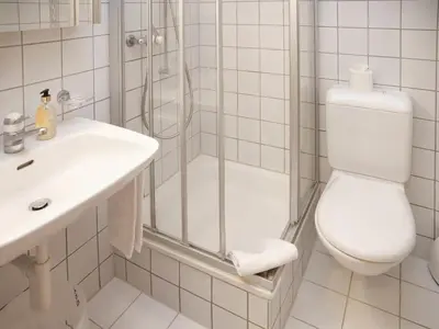 Ein Badezimmer in der Unterkunft Apartment Chalet Abendrot apARTments-30 by Interhome