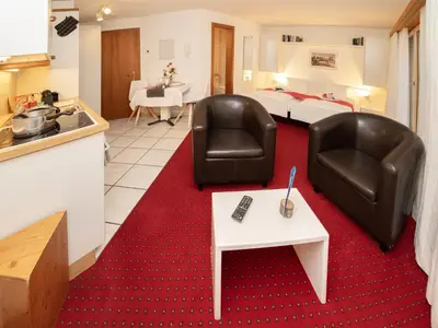 Ein Sitzbereich in der Unterkunft Apartment Chalet Abendrot apARTments-4 by Interhome