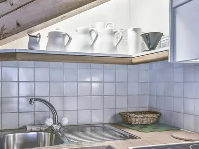 Küche/Küchenzeile in der Unterkunft Apartment Chalet Abendrot apARTments-9 by Interhome