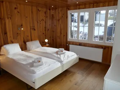 Ein Bett oder Betten in einem Zimmer der Unterkunft Apartment Chalet Anna by Interhome