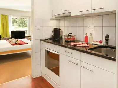 Küche/Küchenzeile in der Unterkunft Apartment Matten - Utoring-12 by Interhome