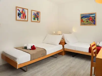 Ein Bett oder Betten in einem Zimmer der Unterkunft Apartment Matten - Utoring-13 by Interhome