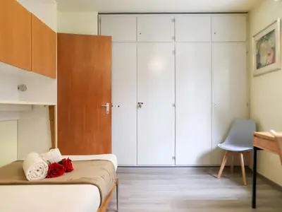 Ein Bett oder Betten in einem Zimmer der Unterkunft Apartment Matten - Utoring-18 by Interhome