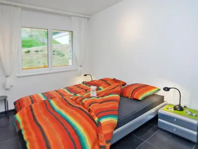 Ein Bett oder Betten in einem Zimmer der Unterkunft Apartment Edelweiss D by Interhome