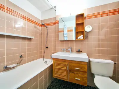 Ein Badezimmer in der Unterkunft Apartment Ringstrasse Apt 115 by Interhome