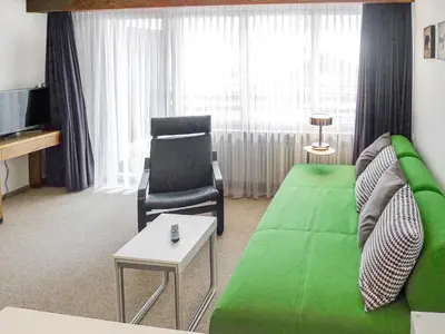 Ein Sitzbereich in der Unterkunft Apartment Ringstrasse Apt 125 by Interhome