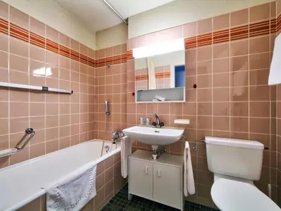 Ein Badezimmer in der Unterkunft Apartment Ringstrasse Apt 125 by Interhome
