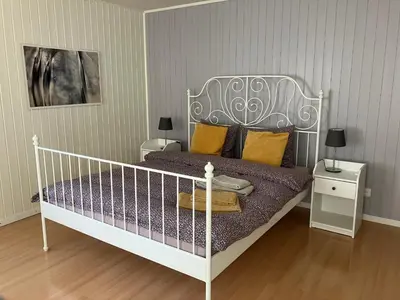 Ein Bett oder Betten in einem Zimmer der Unterkunft La Lanterne
