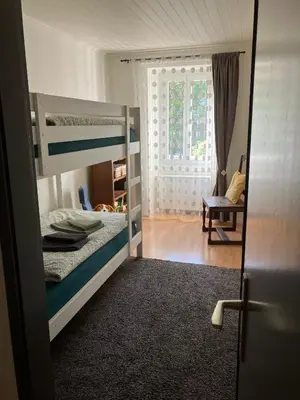 Ein Bett oder Betten in einem Zimmer der Unterkunft La Lanterne