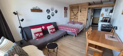 Ein Bett oder Betten in einem Zimmer der Unterkunft Anzère Studio 2-4 personnes