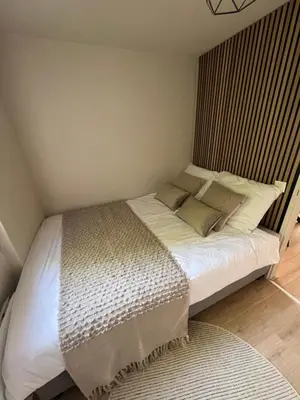 Ein Bett oder Betten in einem Zimmer der Unterkunft Haus Leopold
