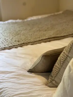 Ein Bett oder Betten in einem Zimmer der Unterkunft Haus Leopold