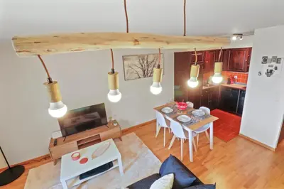 Ein Sitzbereich in der Unterkunft Joli appartement au centre