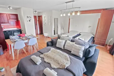 Ein Sitzbereich in der Unterkunft Joli appartement au centre