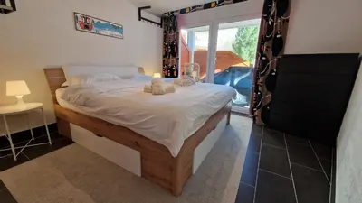 Ein Bett oder Betten in einem Zimmer der Unterkunft Apartment Daniela