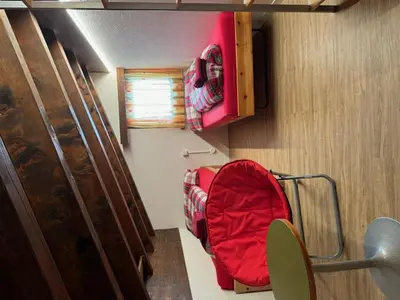 Ein Bett oder Betten in einem Zimmer der Unterkunft Apartment Topas 24 by Interhome