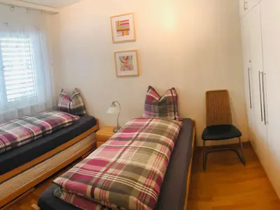 Ein Bett oder Betten in einem Zimmer der Unterkunft Apartment Edelweiss C by Interhome