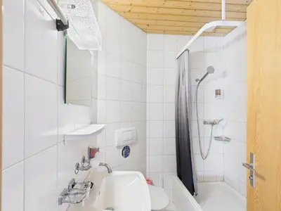 Ein Badezimmer in der Unterkunft Hotel Wildbach Brienz