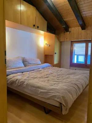 Ein Bett oder Betten in einem Zimmer der Unterkunft Apartment Alps View -Mont Rouge Veysonnaz