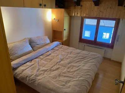 Ein Bett oder Betten in einem Zimmer der Unterkunft Apartment Alps View -Mont Rouge Veysonnaz